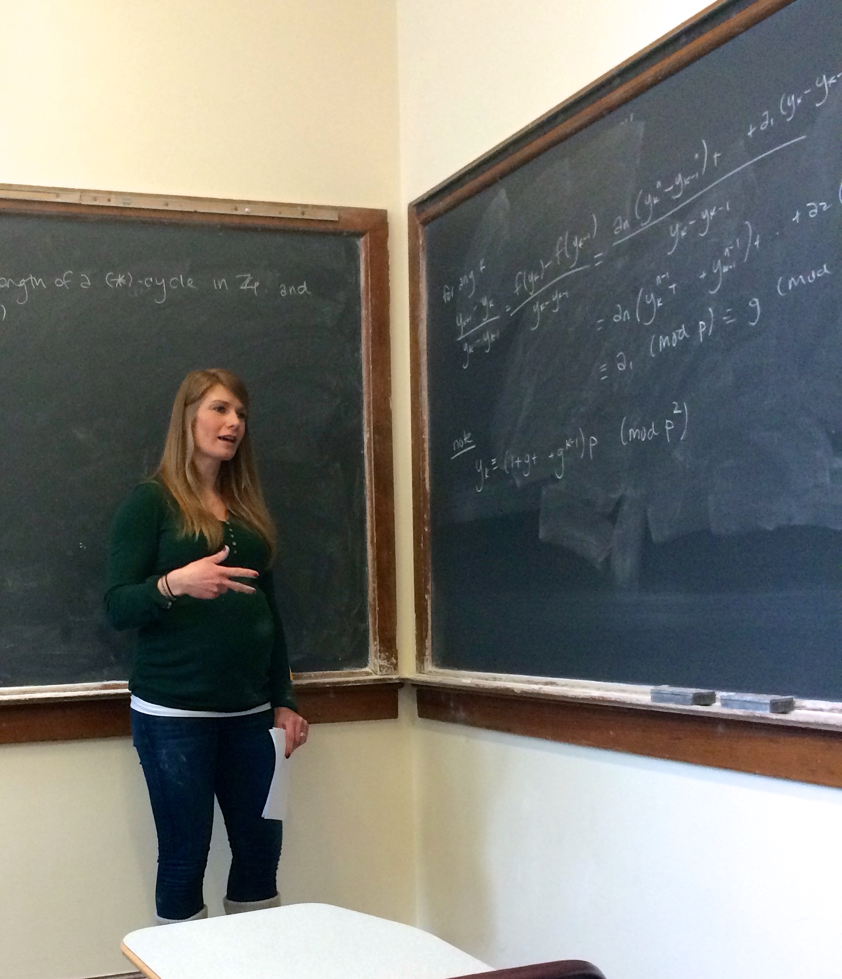Photo of Cara Mullen giving a talk at Northwestern in 2014.